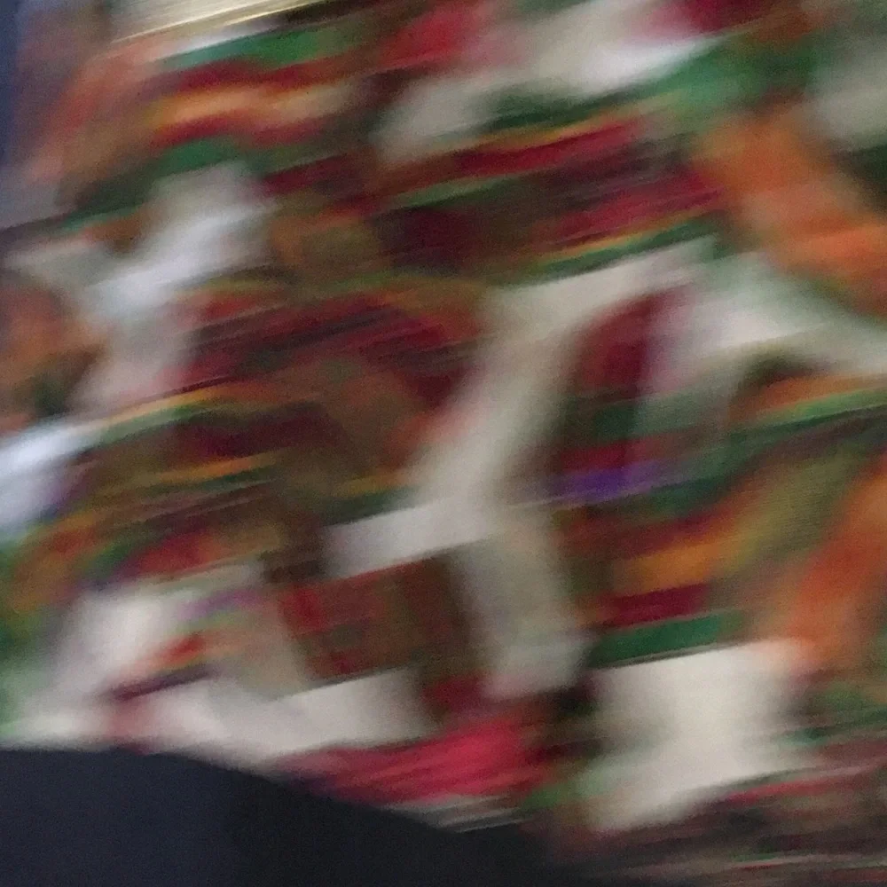 Colorful Gift Wrap with Gold Bow